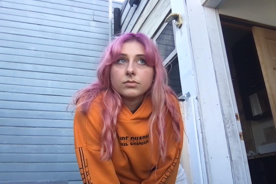 Emma-Jane MacKinnon-Lee orange jumper